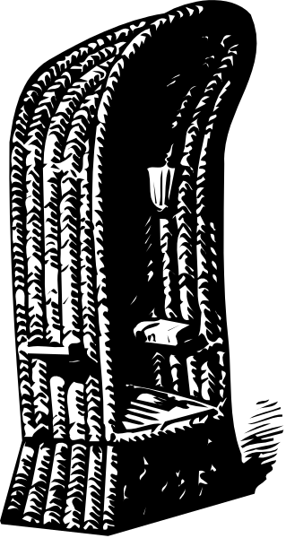 The black and white photo shows a birdcage with an open door on top of what appears to be a table inside it.