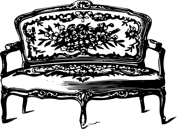 The black and white photo shows a vintage couch with intricate designs on it against an indistinct background.