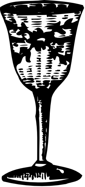 The black and white photo shows a wine glass with an intricate design on it placed next to what appears to be a candle holder in another frame within the image itself.
