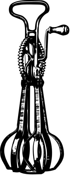 The black and white photo shows a close up of an object that appears to be some kind of mechanical device with gears inside it against a dark background.